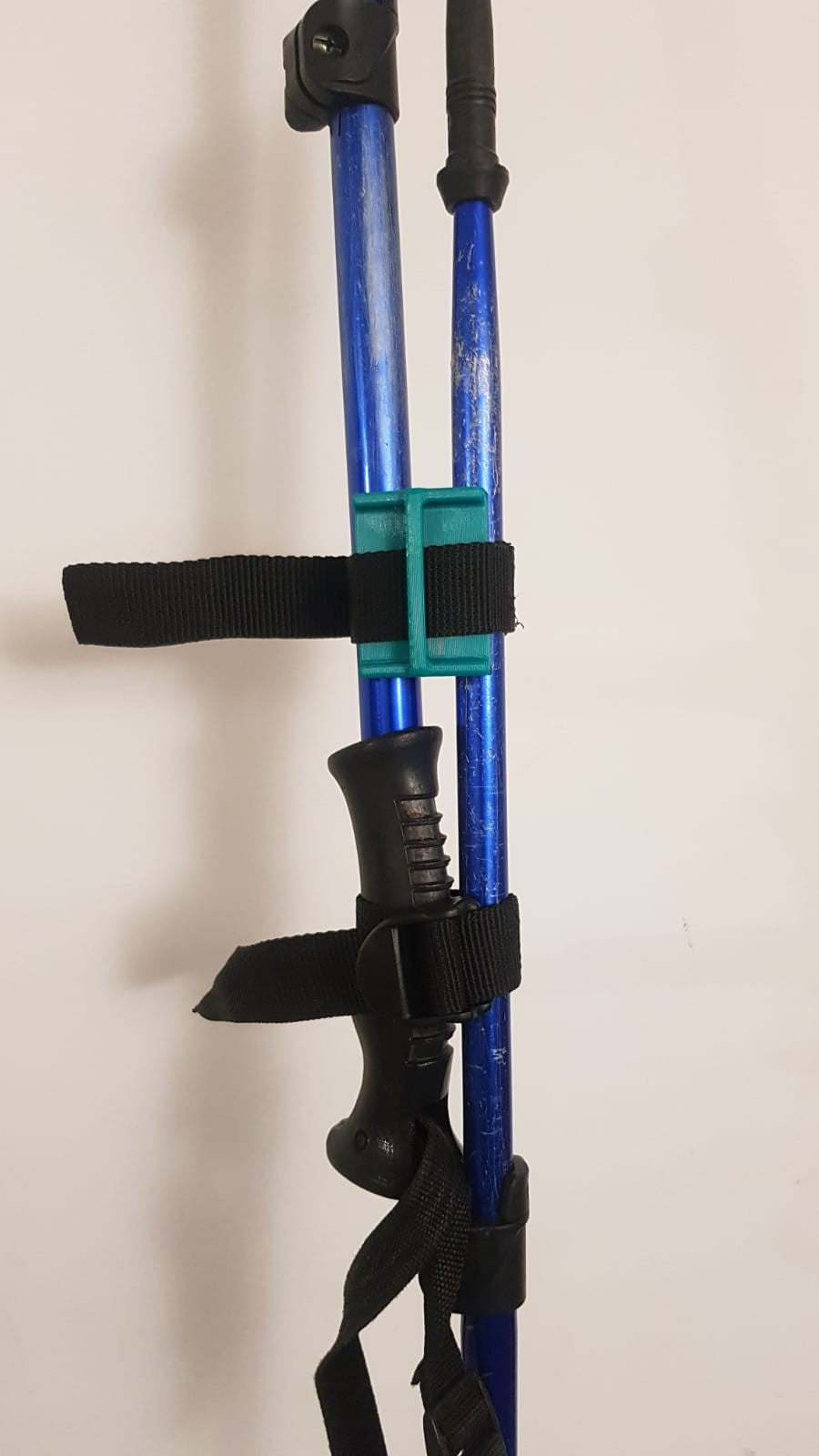 Clip for hiking poles and adapter.