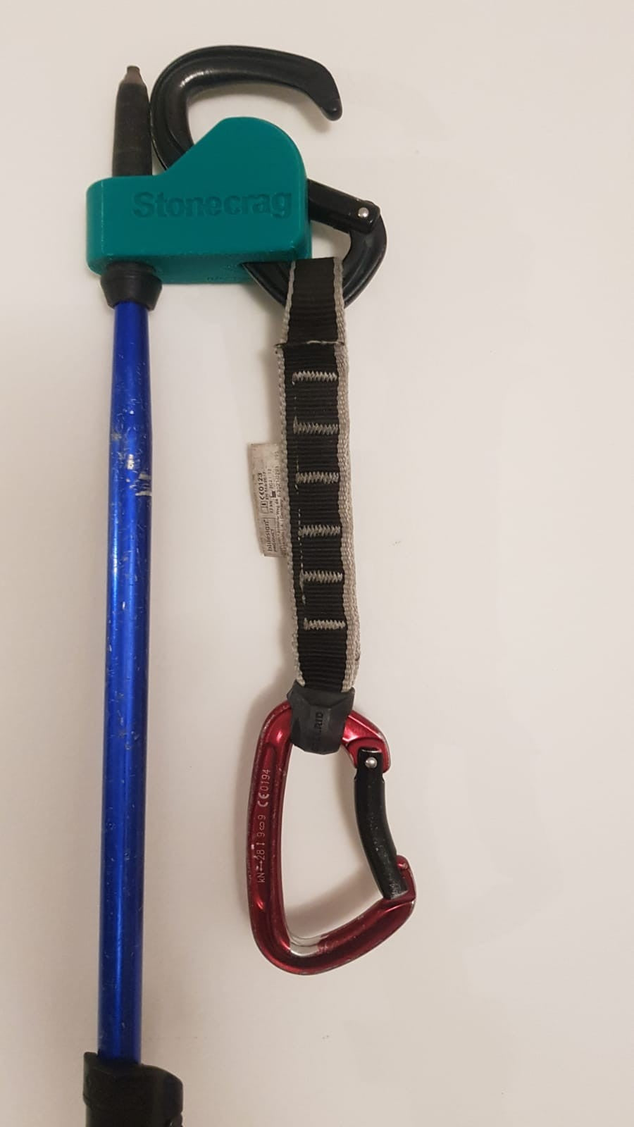 Clip for hiking poles and adapter.