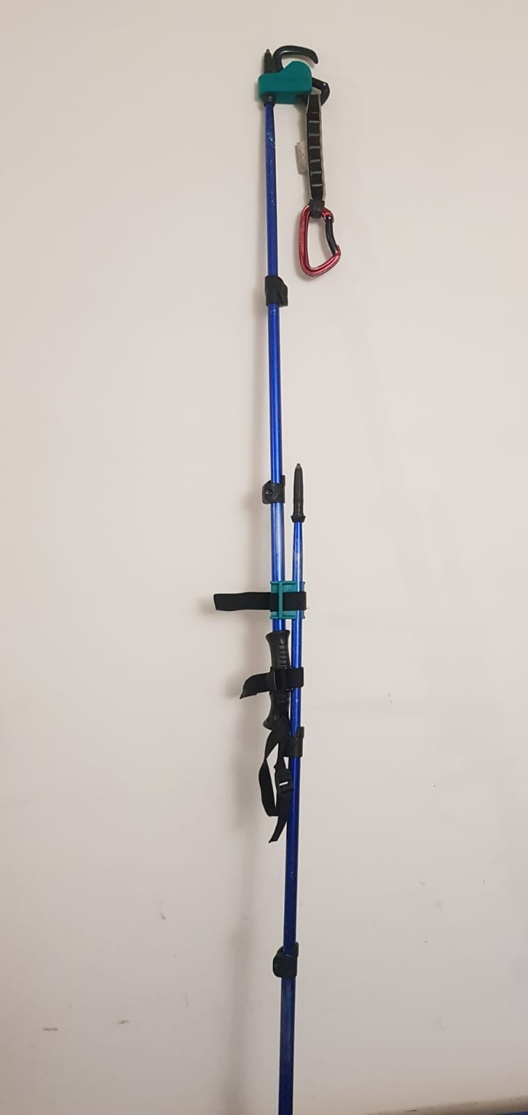 Clip for hiking poles and adapter.